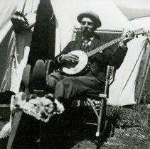 S999.211 Man Playing Banjo