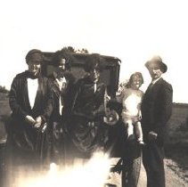 Group Standing by a Car