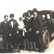 Group Standing by a Car