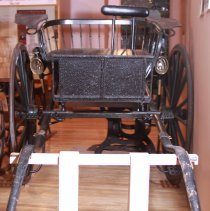 Looking at the front of a two-wheeled carriage
