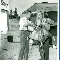 Richard F. Droege holding Helicopter Water Bag