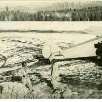 Airplane on Snowy Airfield