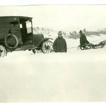 Automobile Pulled out of the Snow by Horses