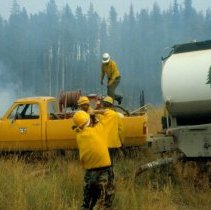 Dryfork Camp - fire fighters with truck and water tanker