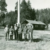 Bud Moore surrounded by eager beaver Bosworth, Parsells
