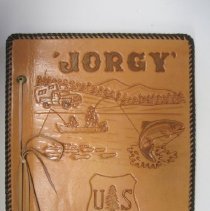 Leather bound notebook of cards