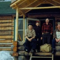 Crew Resting on Cabin Porch
