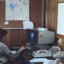Dispatcher at Computer Terminal