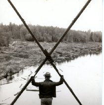 After Recedes, Logs Still Coming Down River