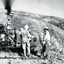 Ranger Loading Hose onto Helicopter