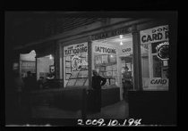 View of tattoo and card room at night, c. 1940s