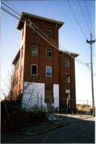 Mill building being demolished