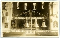 St. Andre's Church banner and bells