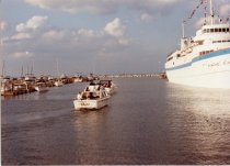 Hammond Marina waterway with boats and Milwaukee Clipper (original)