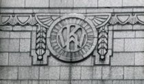 The Kaufmann & Wolfe stone building logo