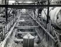 Workers looking up from underneath Michigan Avenue sewer project