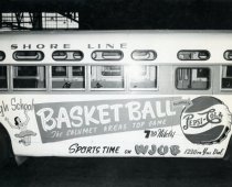 WJOB advertisement on the side of a mid-century bus