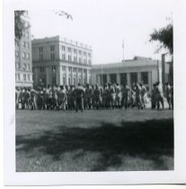 Welcome home procession for military at the green in front of the Mechanics and Farmers Savings Bank