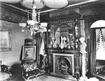 Waldemere interior, fireplace and chair