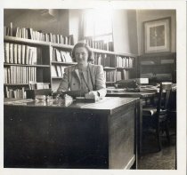 A library staff member at a desk in the Picture Room of the Bridgeport Public Library