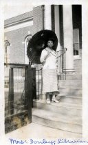 Librarian "Mrs. Donley" in front of the Sanborn Branch of the Bridgeport Public Library