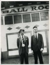 William J. Burke, manager of the Pleasure Beach Ballroom, and James Burke standing outside in front of the Ballroom