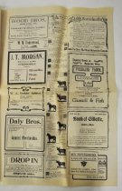 Newspaper (advertisements inside)