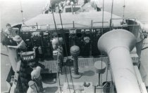 U.S.S. Eisele with the Captain on left in safari hat