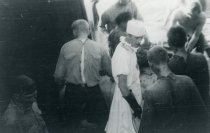 Men acting on the U.S.S. Eisele (cropped)