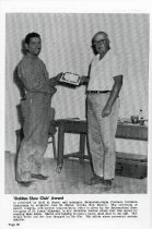 Employee Receiving "Golden Shoe Club" Award ("Sharp Bits" Page 26)