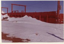 Red Fence & Snow Drift