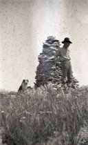 Man Standing In Front of Rocks