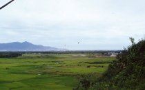 2 US helicopters over Vietnam valley
