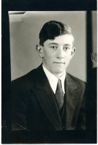 Young man in a dark suit