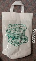 White plastic bag with green Camporee Logo