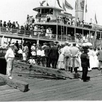 Passengers on the Sagamore Steamer at dock in Glen Cove