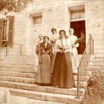 Two sisters with visitors