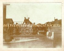Escanaba firemen and horse drawn fire wagon