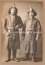 Firemen John Young and Arvid Johnson