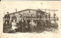 Hunting camp with deer and children