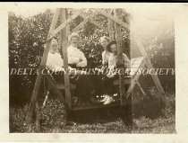 Backyard swing with family