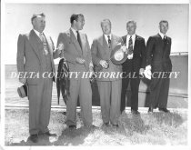 Businessmen with fish