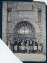 Football team in front of Jefferson School, 1903