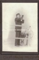 Captain Charles McCauley  at the wheel