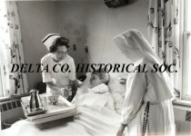 Patient, nurse, sister at St. Francis Hospital