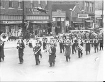 CIty Band marching on Ludington Street