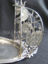 Meriden tilting water pitcher stand (detail)