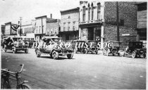 Cars decorated for parade on Ludington Street