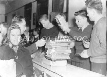 Helen Johnson, Henry Wylie collecting scrap paper