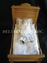 Doll bed with doll